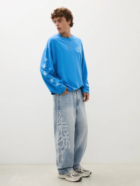 Zdjęcie produktu Bershka Jeansy O Kroju Super Baggy Z Naszywkami Z Boku Mężczyzna Wyblakły Niebieski