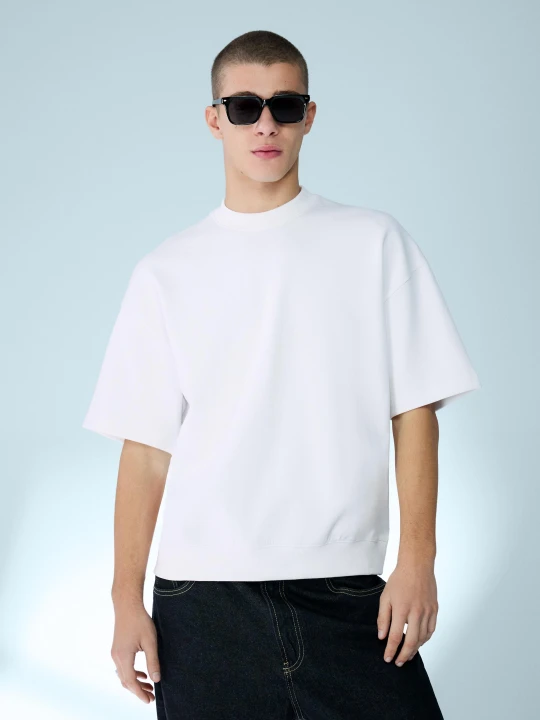 Zdjęcie produktu Bershka Koszulka Z Krótkim Rękawem Z Frotte Z Wykończeniem Rib Mężczyzna Biały Złamany
