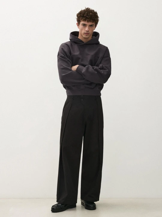 Zdjęcie produktu Bershka Spodnie Baggy O Kroju Baggy, Zakładka, Zapiętek I Fason Krzyżowany Mężczyzna Czarny