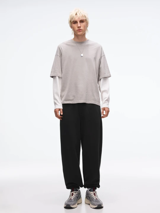 Zdjęcie produktu Bershka Spodnie Jogger Z Dzianiny Dresowej Mężczyzna Czarny