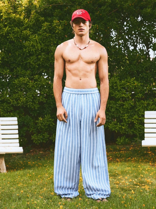 Zdjęcie produktu Bershka Spodnie O Kroju Super Baggy W Stylu Piżamowym Mężczyzna Jasnoniebieski
