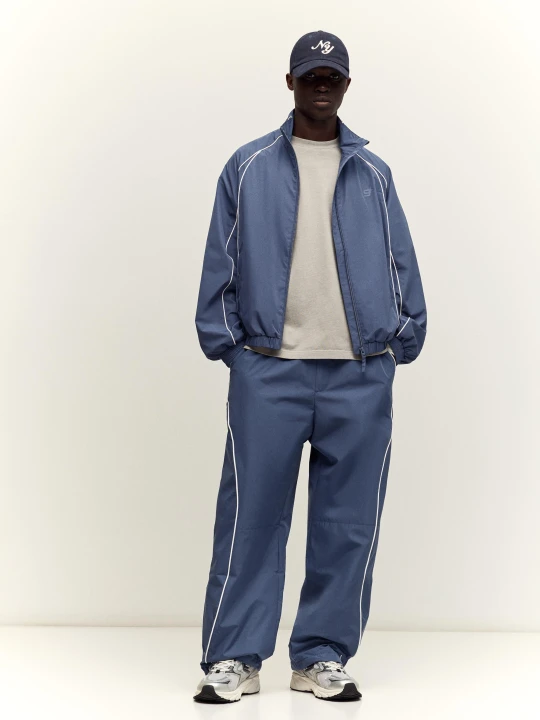 Zdjęcie produktu Bershka Techniczne Spodnie O Kroju Baggy Mężczyzna Niebieski
