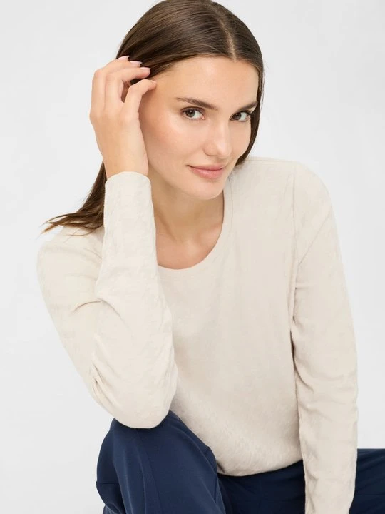 Zdjęcie produktu Beżowa bluzka damska Hannah z fakturą w pepitkę – New Passion Olsen
