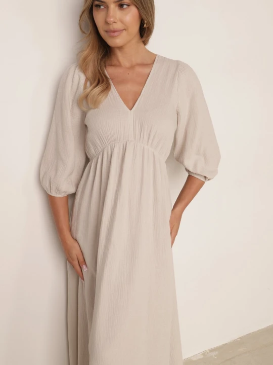 Zdjęcie produktu Beżowa Rozkloszowana Bawełniana Sukienka Boho z Wiązaniem i Gumką w Talii Lawla Jumelle