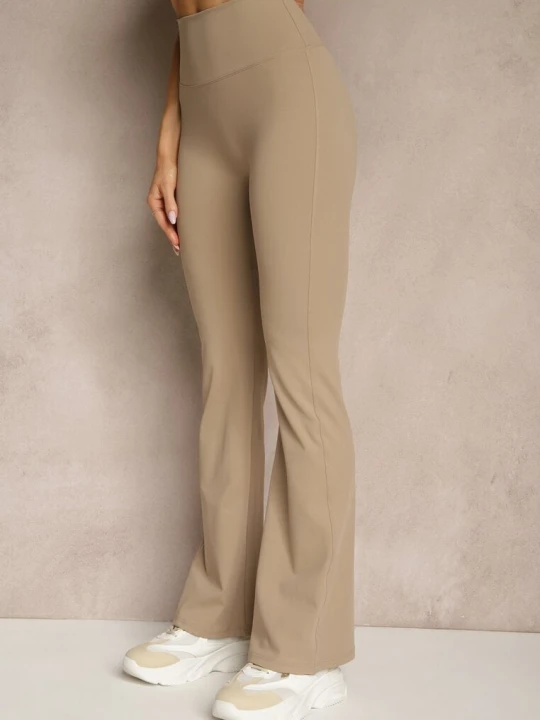 Zdjęcie produktu Beżowe Legginsy Dzwony High Waist Orruvana Yu & Me
