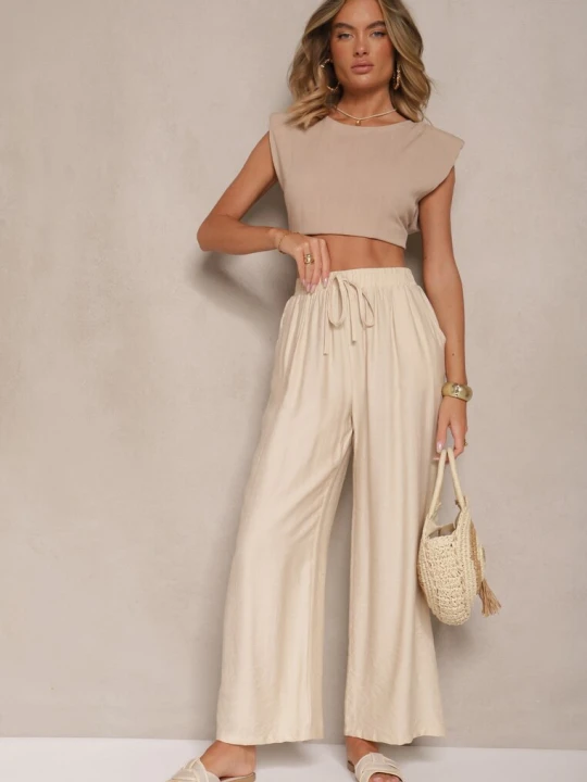 Zdjęcie produktu Beżowe Spodnie o Szerokim Kroju High Waist z Wiązaniem Fenalin Melya By Melody