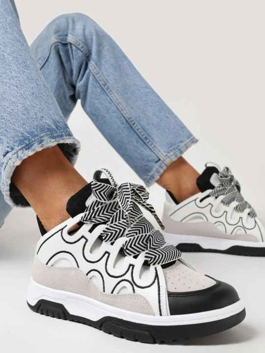 Zdjęcie produktu Białe Sneakersy z Przeszyciami i Szerokim Wiązaniem Leontine