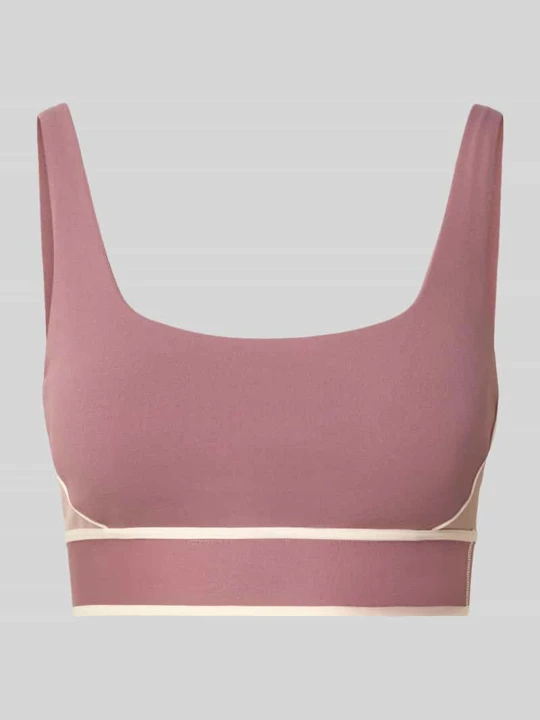 Zdjęcie produktu biustonosz sport o kroju slim fit z detal z logo Fabletics Brudnoróżowy