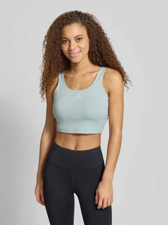 Zdjęcie produktu Biustonosz sportowy o kroju slim fit z nadrukiem z logo Adidas Miętowy