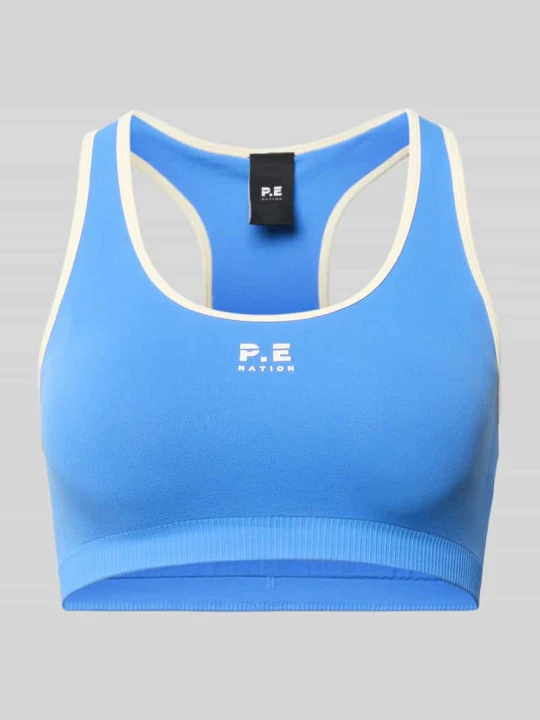 Zdjęcie produktu Biustonosz sportowy z nadrukiem logo i niskim wsparciem P.E Nation Królewski niebieski