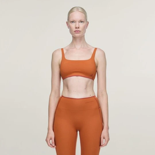 Zdjęcie produktu Biustonosz treningowy zapewniający niskie wsparcie adidas x entire studios Optime Fox Red
