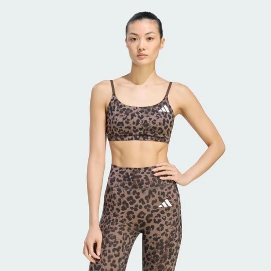 Zdjęcie produktu Biustonosz w panterkę z lekkim wsparciem i 3 paskami Optime Essentials Adidas