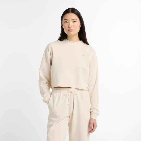 Zdjęcie produktu Bluza damska New Balance WT51514LIN – beżowa