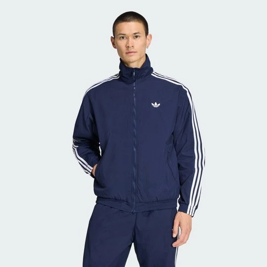 Zdjęcie produktu BLUZA DRESOWA FIREBIRD WOVEN Adidas Night Indigo