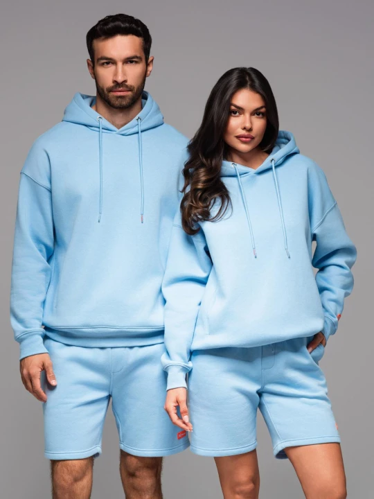 Zdjęcie produktu Bluza dresowa unisex z kapturem i kieszeniami – błękitna V8 - Rozmiar: XL / XXL Ombre Clothing błękitny