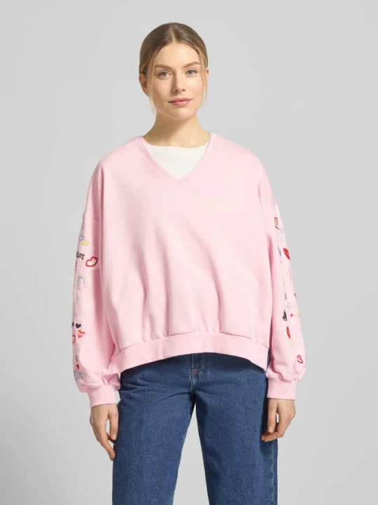 Zdjęcie produktu Bluza o kroju oversized fit z dekoltem w serek Smith & Soul Jasnoróżowy