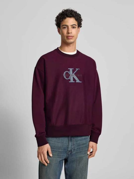 Zdjęcie produktu Bluza o kroju oversized fit z wyhaftowanym logo model ‘Premium’ Calvin Klein Jeans Bordowy