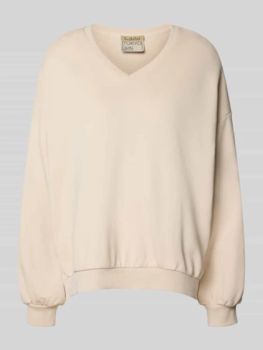 Zdjęcie produktu Bluza o kroju oversized z dekoltem w serek Smith & Soul Écru