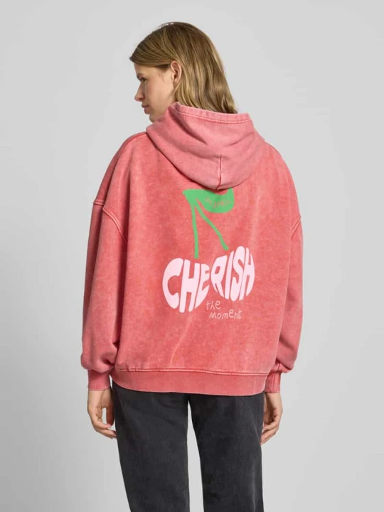 Zdjęcie produktu Bluza o kroju oversized z kapturem i kieszenią kangurką model ‘Cherish’ Oh April Koralowy