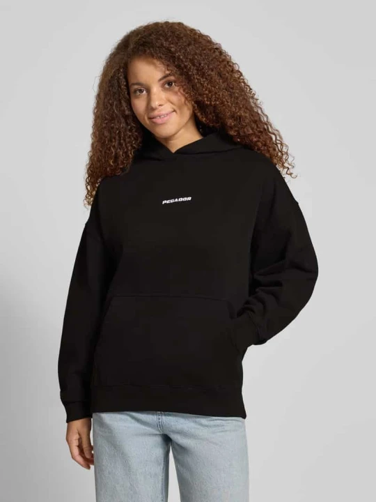 Zdjęcie produktu Bluza o kroju oversized z kapturem i wyhaftowanym logo model ‘CLARITA’ Pegador Czarny