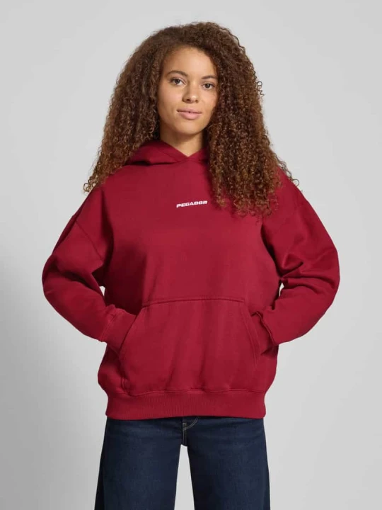 Zdjęcie produktu Bluza o kroju oversized z kapturem i wyhaftowanym logo model ‘CLARITA’ Pegador Bordowy