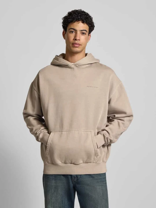 Zdjęcie produktu Bluza o kroju oversized z kapturem, logo i kieszenią kangurką Pegador Grafitowy