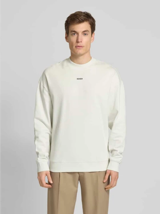 Zdjęcie produktu Bluza o kroju oversized z nadrukiem z logo model ‘Dapocrew’ Hugo Złamany biały