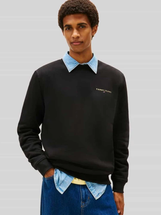 Zdjęcie produktu Bluza o kroju regular fit z małym napisem z logo Tommy Jeans Czarny