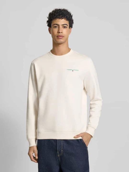 Zdjęcie produktu Bluza dresowa z mieszanki bawełny w kroju regular fit model 'LINEAR CREW' Tommy Jeans Złamany biały