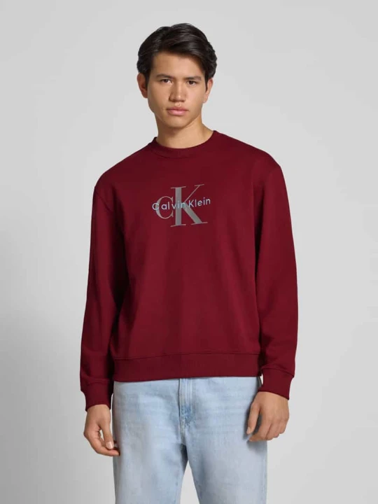 Zdjęcie produktu Bluza o kroju regular fit z nadrukiem z logo model ‘Terry’ Calvin Klein Jeans Bordowy