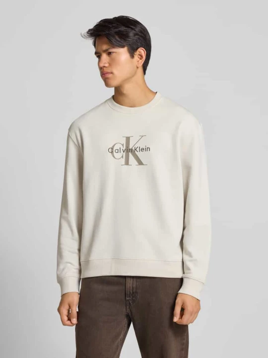 Zdjęcie produktu Bluza o kroju regular fit z nadrukiem z logo model ‘Terry’ Calvin Klein Jeans Złamany biały