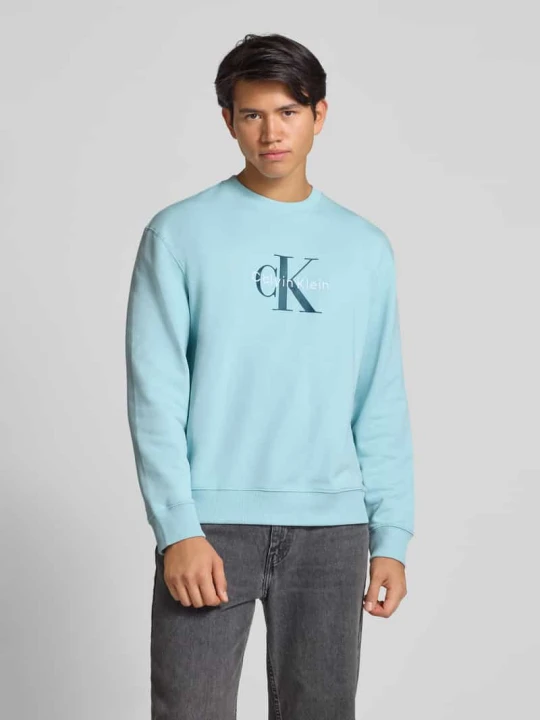 Zdjęcie produktu Bluza o kroju regular fit z nadrukiem z logo model ‘Terry’ Calvin Klein Jeans Jasnoniebieski