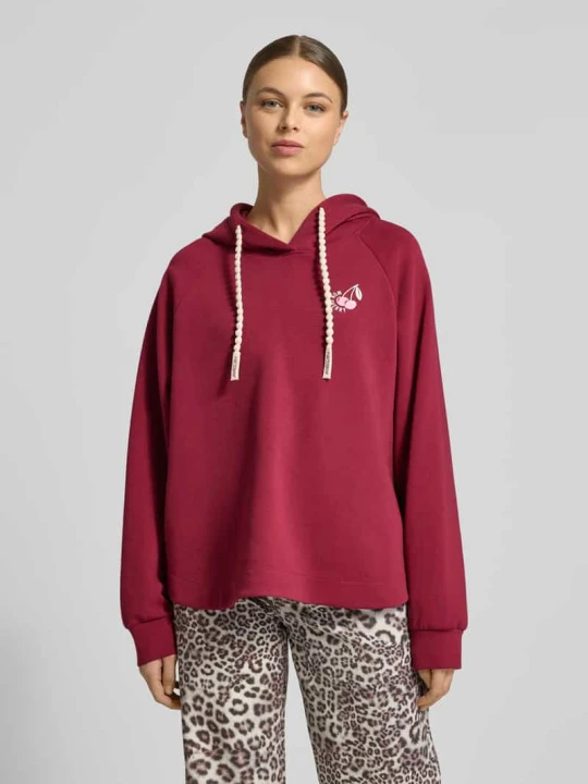 Zdjęcie produktu Bluza z kapturem o kroju relaxed fit z nadrukiem z motywem Marc Cain Wiśniowy