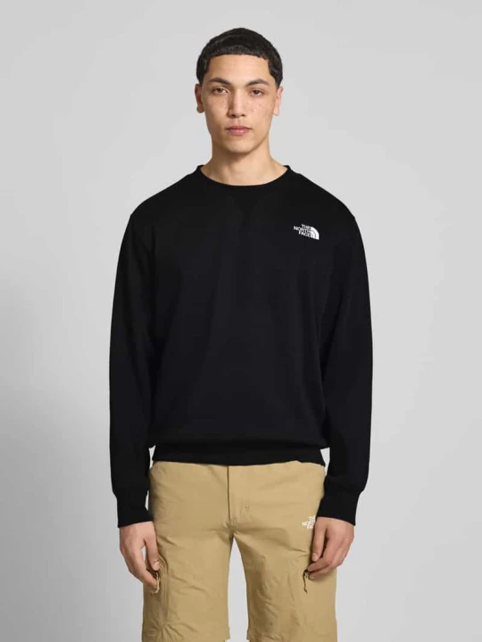 Zdjęcie produktu Bluza o kroju relaxed fit z wyhaftowanym logo model „ESSENTIAL” The North Face Czarny