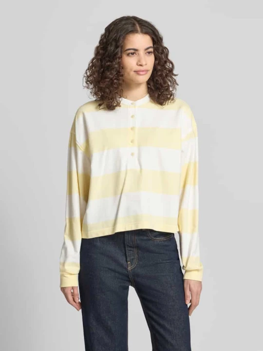 Zdjęcie produktu Bluza o kroju relaxed fit z wyhaftowanym logo model „Varsity” Calvin Klein Jeans Jasnożółty