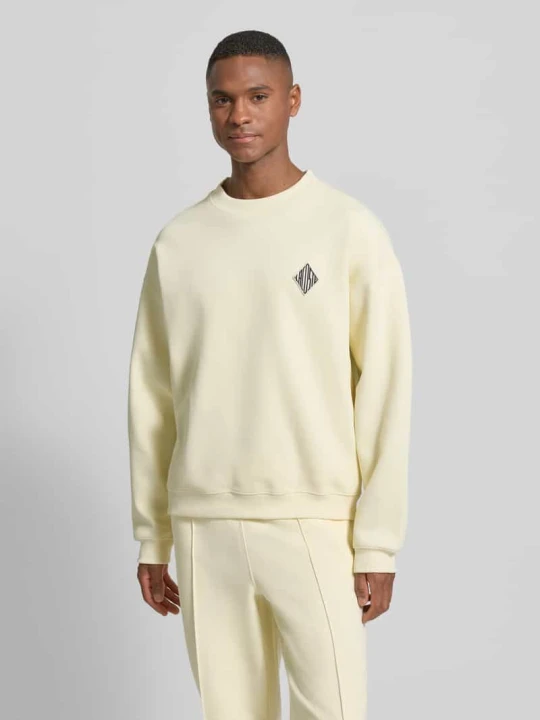 Zdjęcie produktu Bluza o luźnym kroju z mieszanki bawełny Lacoste Écru
