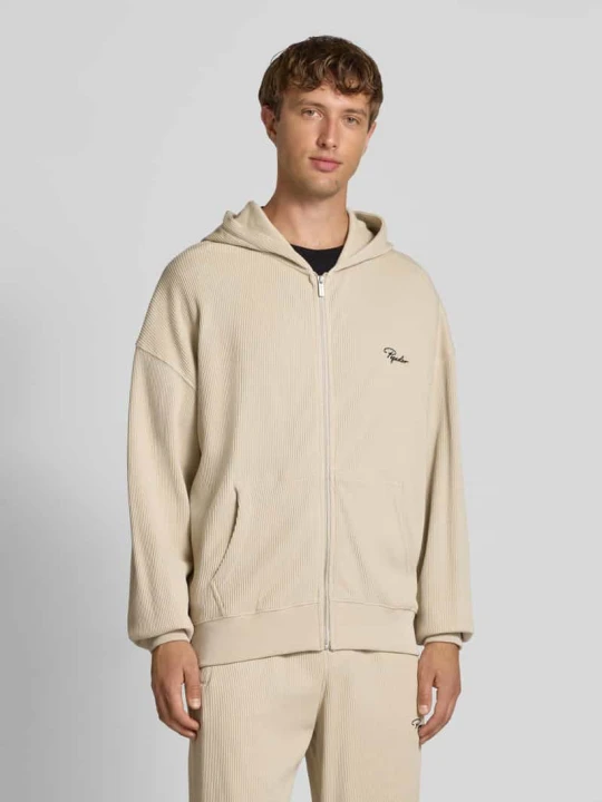 Zdjęcie produktu Bluza rozpinana o kroju oversized z kapturem i wyhaftowanym logo Pegador Écru