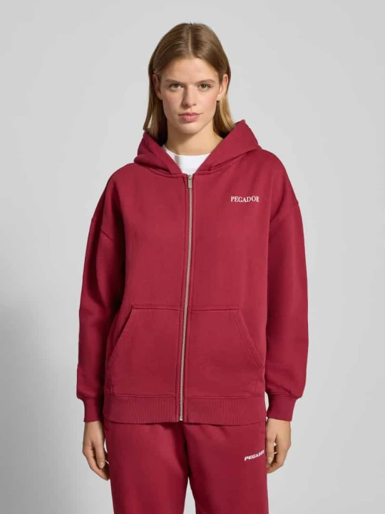 Zdjęcie produktu Bluza rozpinana o kroju oversized z kapturem model ‘LANCY’ Pegador Bordowy