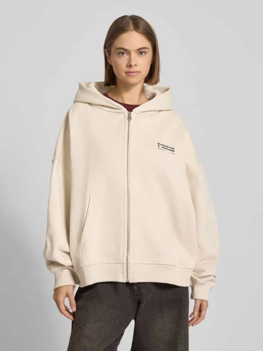 Zdjęcie produktu Bluza rozpinana o kroju oversized z kieszenią kangurką Karo Kauer Beżowy