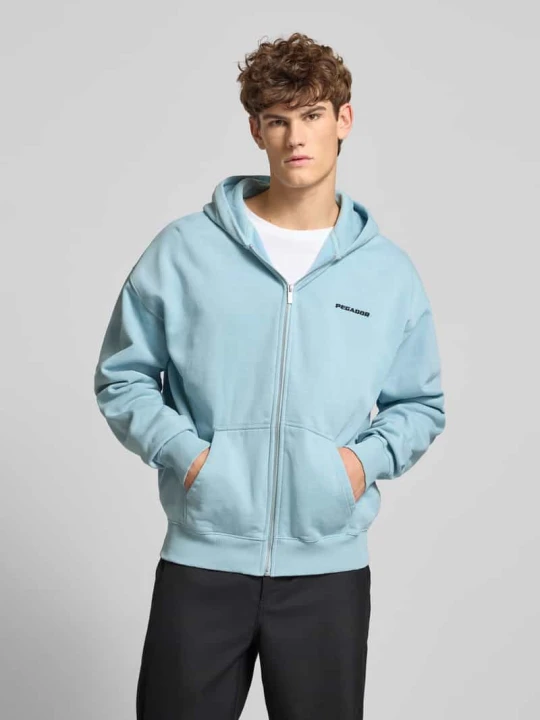 Zdjęcie produktu Bluza rozpinana o kroju oversized z logo Pegador Jasnoniebieski