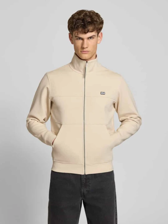 Zdjęcie produktu bluza rozpinana z naszywką z logo model 'KOSTER' Helly Hansen Złamany biały
