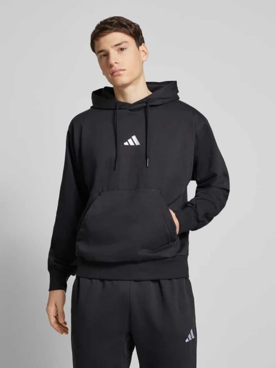 Zdjęcie produktu Bluza z kapturem i wyhaftowanym logo model ‘FEELCOZY’ Adidas Czarny