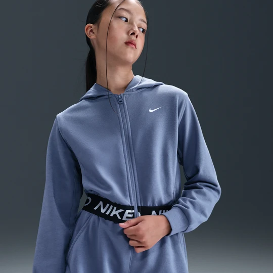 Zdjęcie produktu Bluza z kapturem i zamkiem na całej długości dla dużych dzieci (dziewcząt) Dri-FIT Nike Pro Fleece - Niebieski