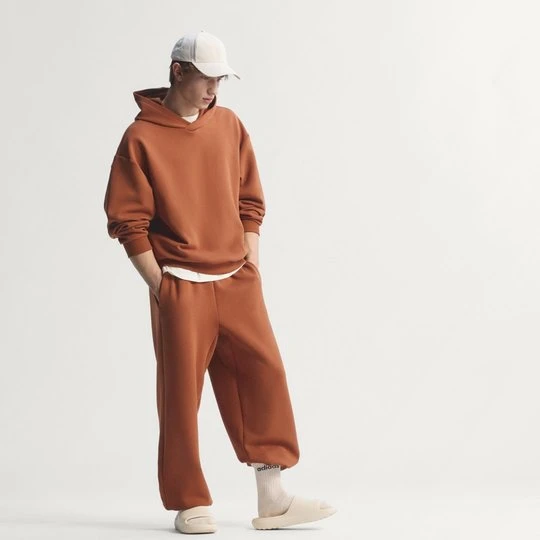 Zdjęcie produktu BLUZA Z KAPTUREM SOFT LUX Adidas Dusky Bronze