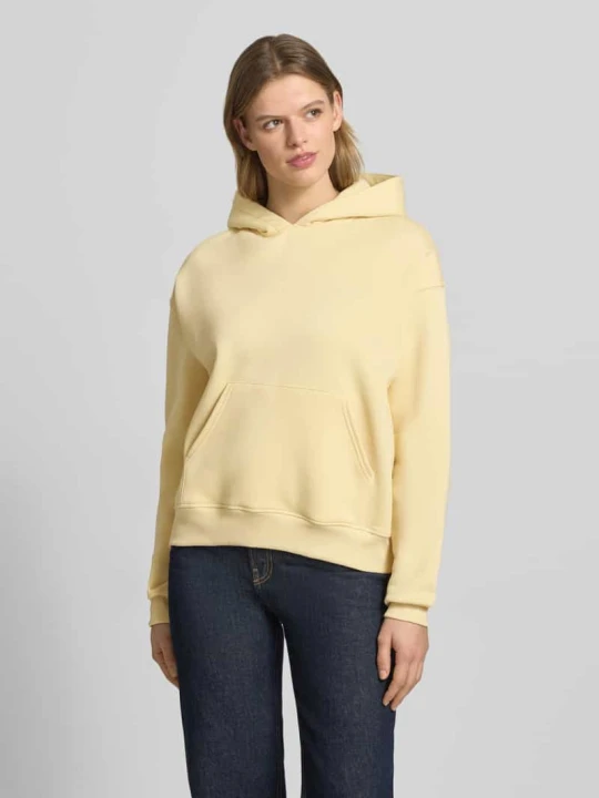 Zdjęcie produktu bluza z kapturem w kroju regular fit z kieszenią kangurka model 'Iconic' Gina Tricot Jasnożółty