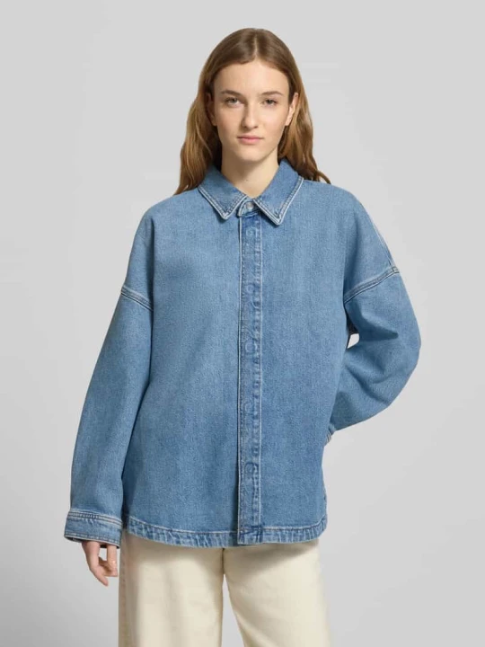 Zdjęcie produktu Bluzka jeansowa z kołnierzykiem koszulowym Calvin Klein Jeans Jeansowy niebieski