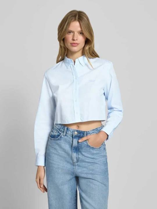Zdjęcie produktu Bluzka koszulowa o kroju cropped fit z czystej bawełny Tommy Jeans Jasnoniebieski