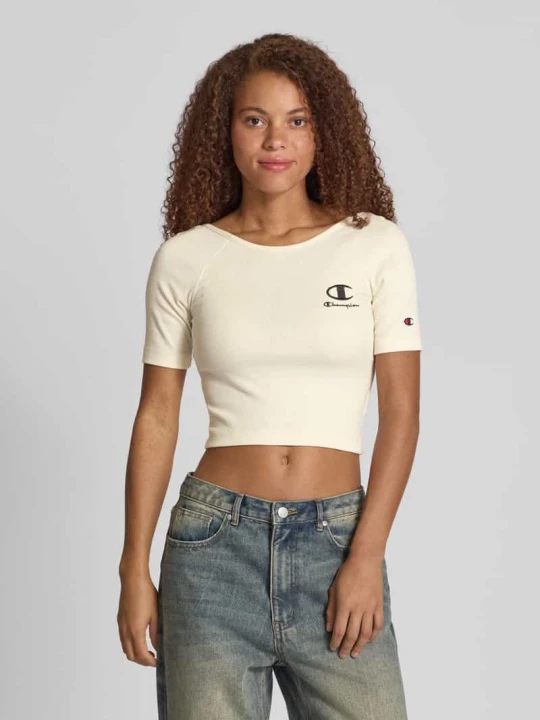 Zdjęcie produktu Top Slim Fit crop z wyhaftowanym logo Champion Écru