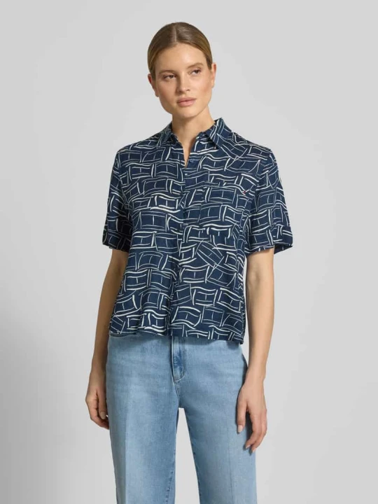 Zdjęcie produktu Bluzka lniana o kroju loose fit z brustaszą Tommy Hilfiger Granatowy