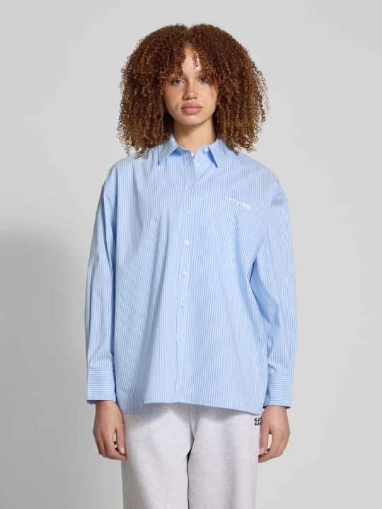 Zdjęcie produktu Bluzka o kroju oversized z wyhaftowanym logo model ‘EVA’ Pegador Jasnoniebieski